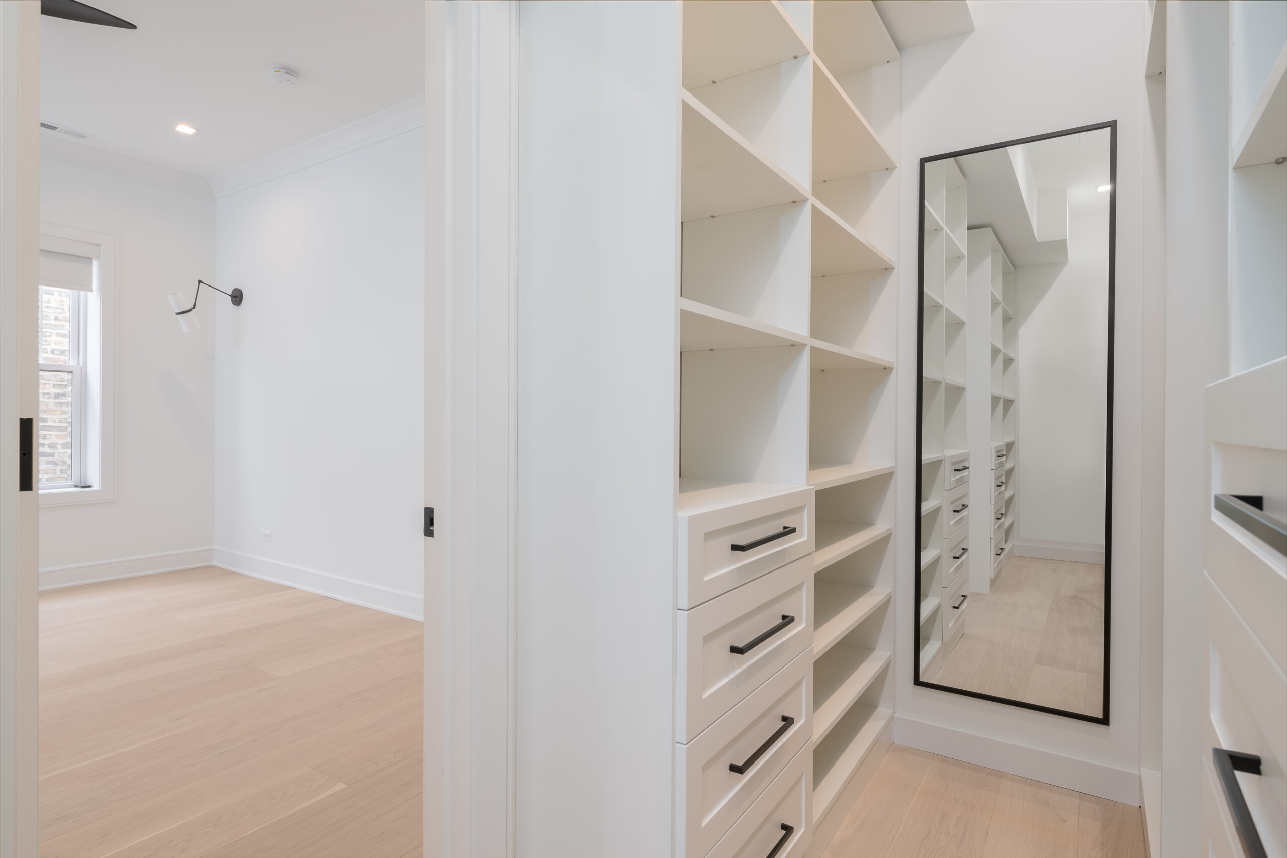 Custom-built closet shelving and storage solutions.