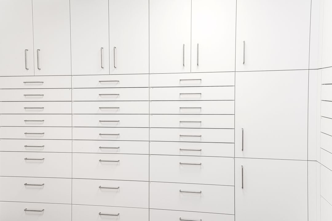 This image showcases custom pharmacy cabinets, built to meet specific storage needs in medical settings. These cabinets are designed for both durability and ease of access.